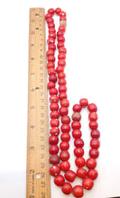 Load image into Gallery viewer, Venetian Red And White Dot Skunks, African Trade, Beads late 19th, centuries
